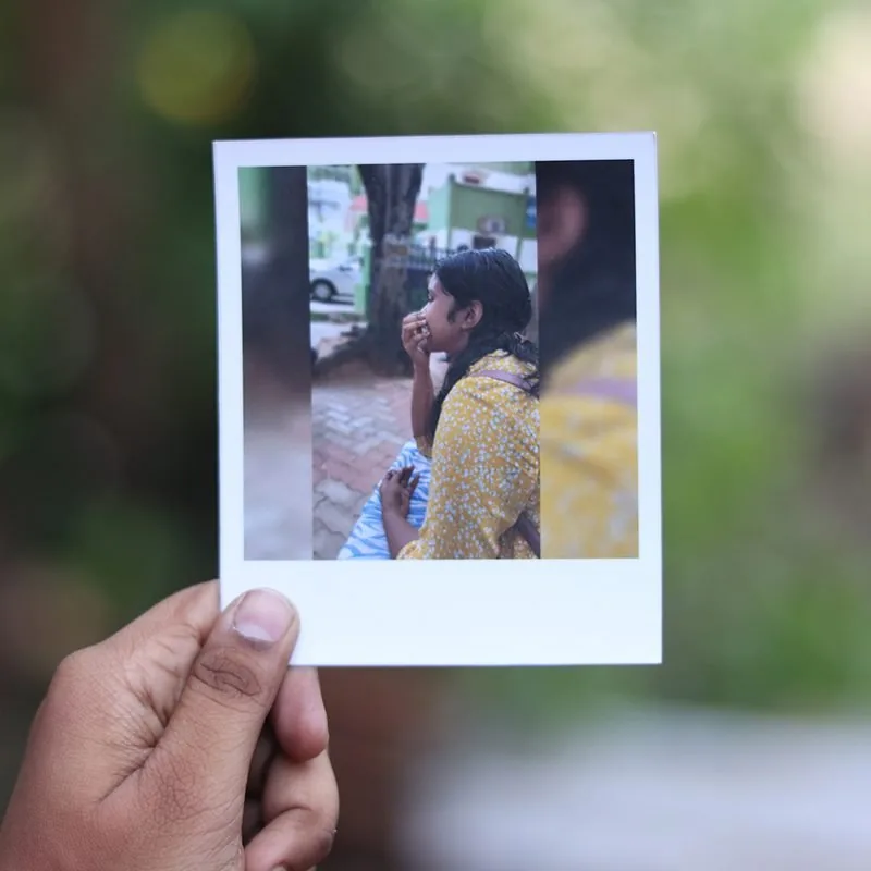 Lilly's Little Gifts Instagram post — customer holding custom polaroids