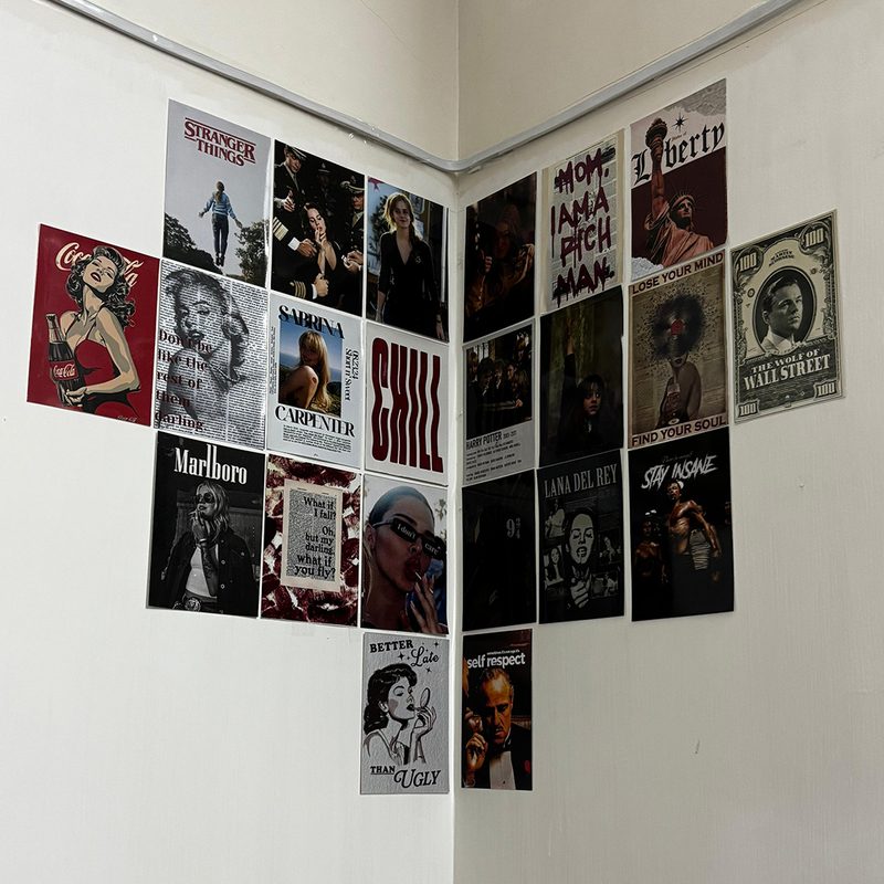 A6 mini poster pack on customer wall — budget gift idea